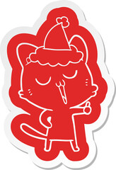 cartoon  sticker of a cat singing wearing santa hat
