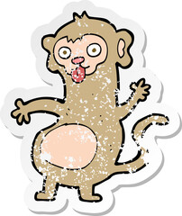 retro distressed sticker of a funny cartoon monkey