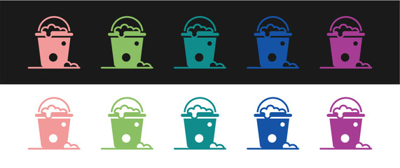 Set Bucket with foam and bubbles icon isolated on black and white background. Cleaning service concept. Vector