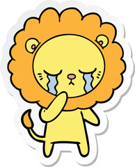 sticker of a crying cartoon lion