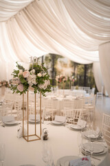 Fototapeta na wymiar Luxury, elegant wedding reception table arrangement, floral centerpiece