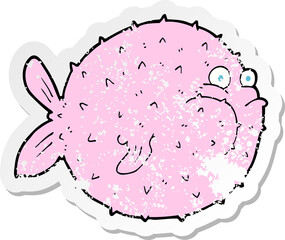 retro distressed sticker of a cartoon puffer fish © lineartestpilot