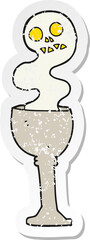 retro distressed sticker of a cartoon spooky halloween goblet