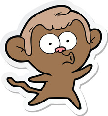 sticker of a cartoon surprised monkey
