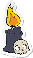 sticker of a cartoon skull and candle