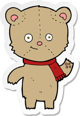 sticker of a cartoon teddy bear waving