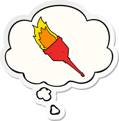 cartoon flaming torch and thought bubble as a printed sticker