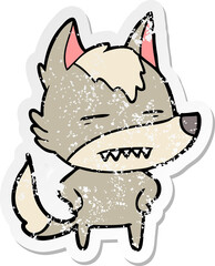 distressed sticker of a cartoon wolf showing teeth
