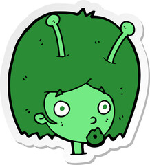 sticker of a cartoon alien girl