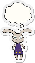 cute cartoon rabbit and thought bubble as a printed sticker