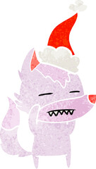 retro cartoon of a wolf showing teeth wearing santa hat
