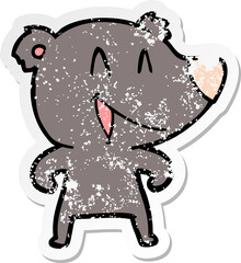 distressed sticker of a laughing bear cartoon