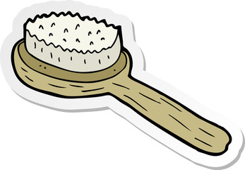 sticker of a cartoon old brush