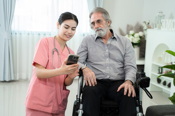 Nurse and senior man using smartphone in a retirement home,Senior services and geriatric care concept.