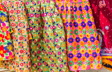 Colorful traditional indian fabric at a street market in Jaipur, India