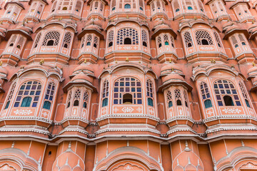 Fototapeta na wymiar Colorful windows of the Palace of the Winds in Jaipur, India