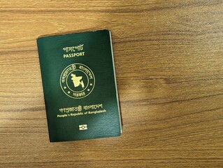 Bangladesh passport on a wooden background