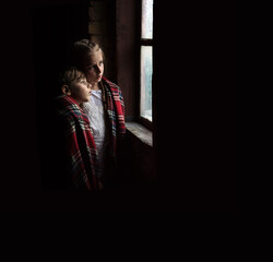 Small kids at the window
