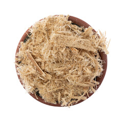 Small bowl filled with shredded slippery elm bark on a white background top view. - 584308472