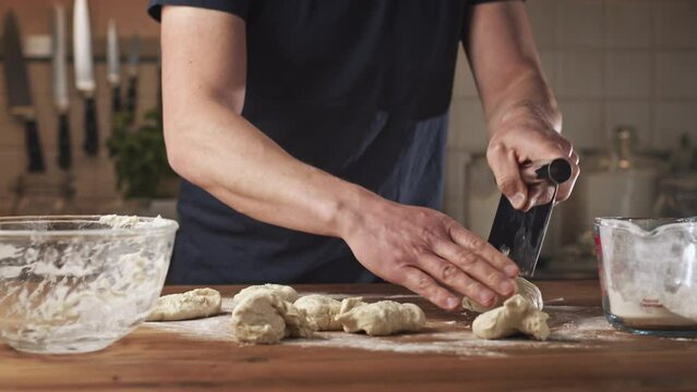 Home baking - making fresh Greek bagels or koulouri of Thessaloniki.