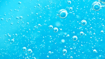 Turquoise background water texture close up with bubbles underwater