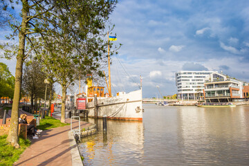 Old steamboat at the promenade in historic city Leer, Germany