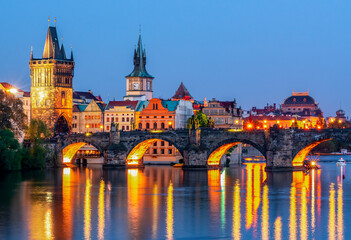 Fototapeta na wymiar Prague medieval architecture and Charles bridge over Vltava river at night, Czech Republic