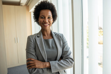Portrait of an African -American businesswoman standing in her office.