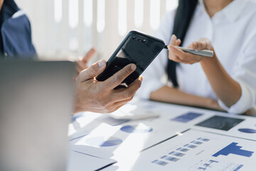 Business consultant meeting analyzes marketing growth research and business strategy planning. Investment data analysis financial planning and accounting.