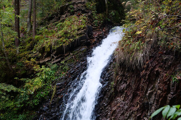 Zhenetskyi Huk waterfall in Carpathians, Gorgany mountains, western Ukraine