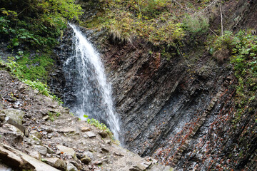 Obraz premium Zhenetskyi Huk waterfall in Carpathians, Gorgany mountains, western Ukraine