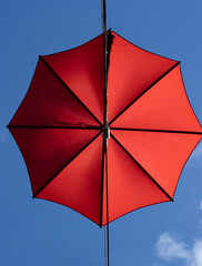 red umbrella on sky