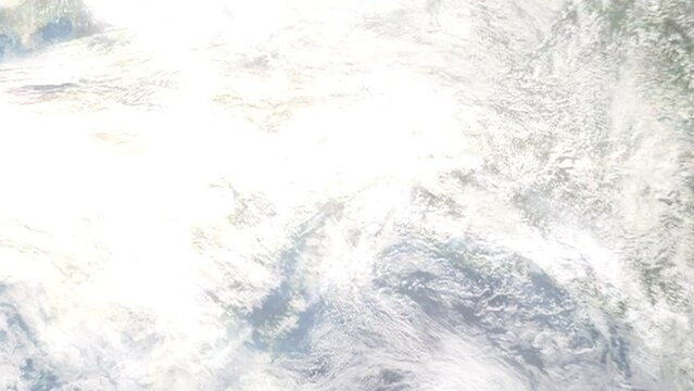 Earth zoom in from outer space to city. Zooming on Wasilla, Alaska, USA. The animation continues by zoom out through clouds and atmosphere into space. Images from NASA