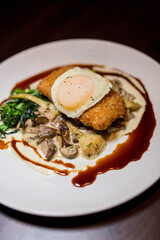 Schnitzel with a fried egg on top