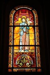 Saint-Pierre de Neuilly catholic church. Neuilly, France. Stained glass window. Joan of Ark.