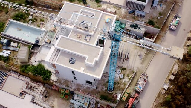 Aerial view of a building construction process in the city