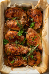 Roasted, grilled or smoked chicken carved into pieces.