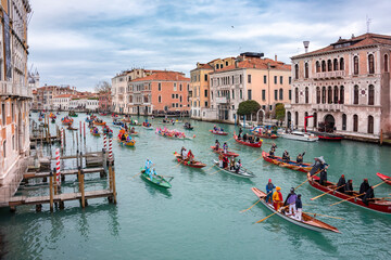 Fototapeta na wymiar Venice, Italy, Grand canal. Venice carnival opening with gondola boat water parade