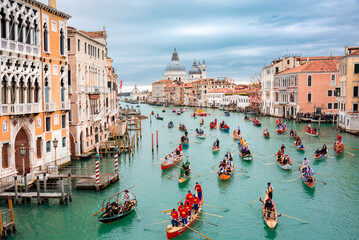 Venice, Italy, Grand canal. Venice carnival opening with gondola boat water parade - obrazy, fototapety, plakaty