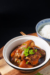 Food concept Spot focus Homemade Asian 5 spice  braised pork on black background with copy space