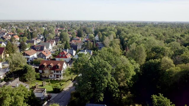 Beautiful view of buildings and park with trees in the city of Munich, Germany