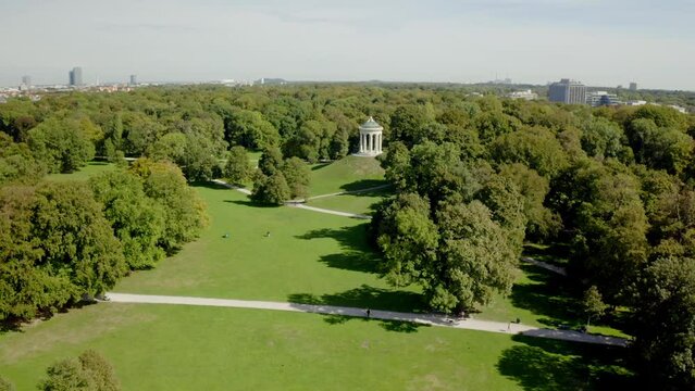 Beautiful view of a gazebo and park with trees in the city of Munich, Germany