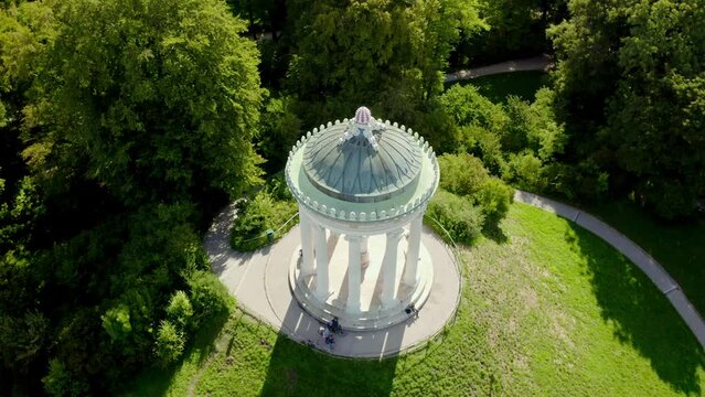 Beautiful view of a gazebo and park with trees in the city of Munich, Germany