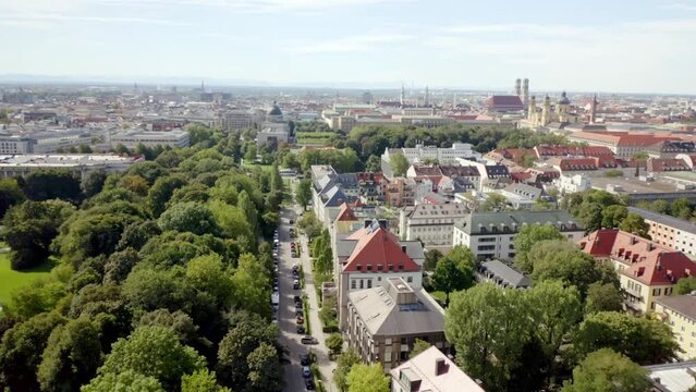 Beautiful view of buildings and park with trees in the city of Munich, Germany