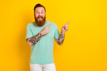 Portrait of overjoyed stylish man boyfriend wear trendy green mint clothes two arm direct empty...