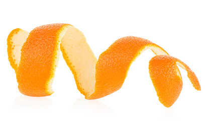 Orange peel in spiral form isolated on a white background. Skin of orange fruit.