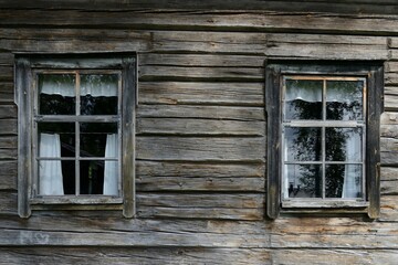 Naklejka na ściany i meble Pair of old windows on the very old timber wall