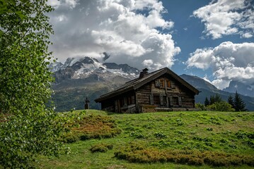 View of a wooden cottage in the mountains