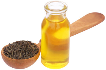 Caraway seeds with essential oil in glass bottle