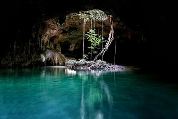 Beautiful shot of a cave of Two Eyes Cenote in Tulum Mexico